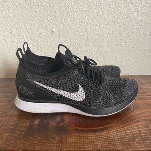 Black Nike Womens Flyknit Racer Size 7